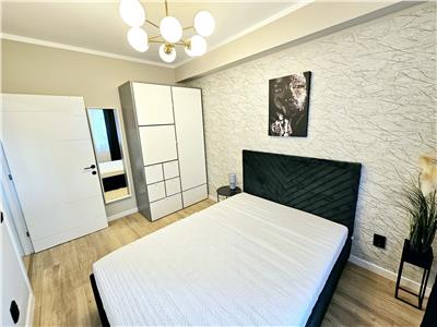 Apartament cu 2 camere si gradina la cheie nou mobilat si utilat.