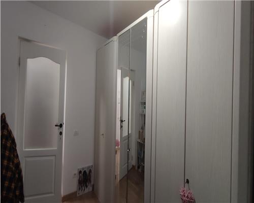 Apartament cu 3 camere 57 mp, 2 bai, parter inalt in Floresti.