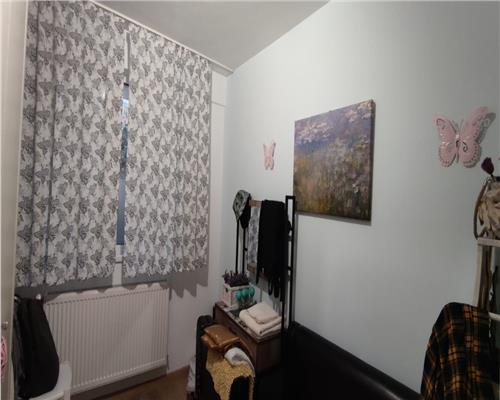 Apartament cu 3 camere 57 mp, 2 bai, parter inalt in Floresti.