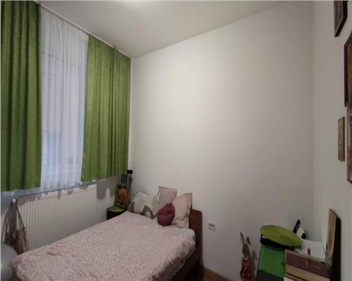 Apartament cu 3 camere 57 mp, 2 bai, parter inalt in Floresti.